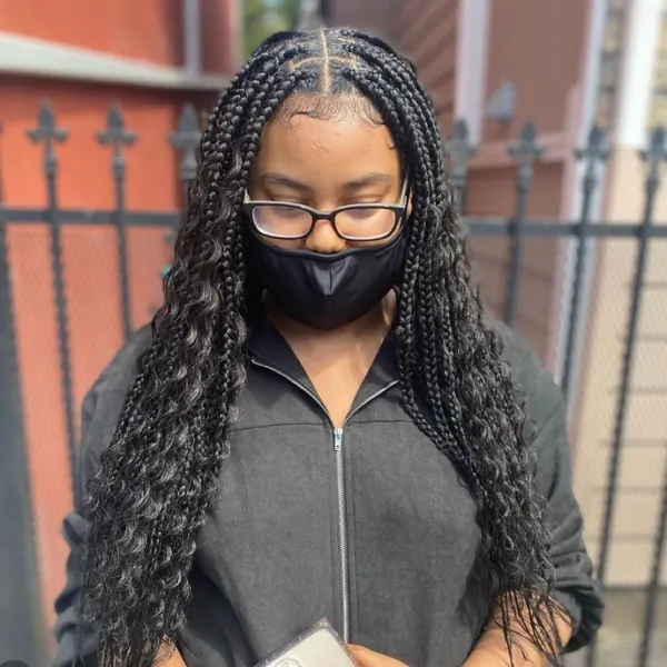 Hair work by Braids By Us