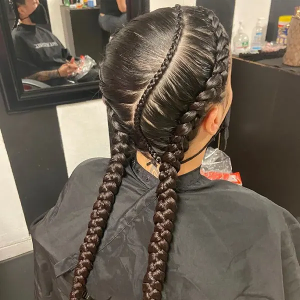 Hair work by Braids By Us