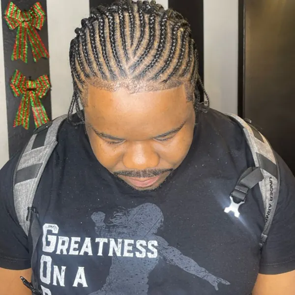 Hair work by Braids By Us