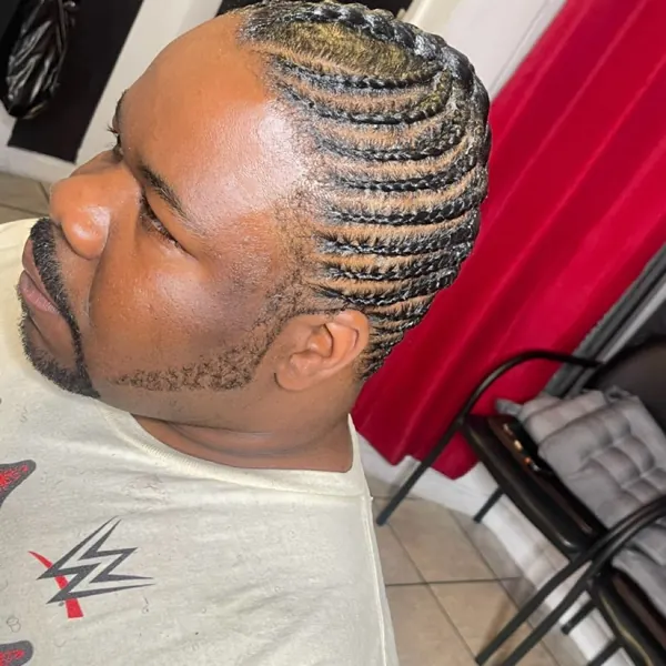Hair work by Braids By Us