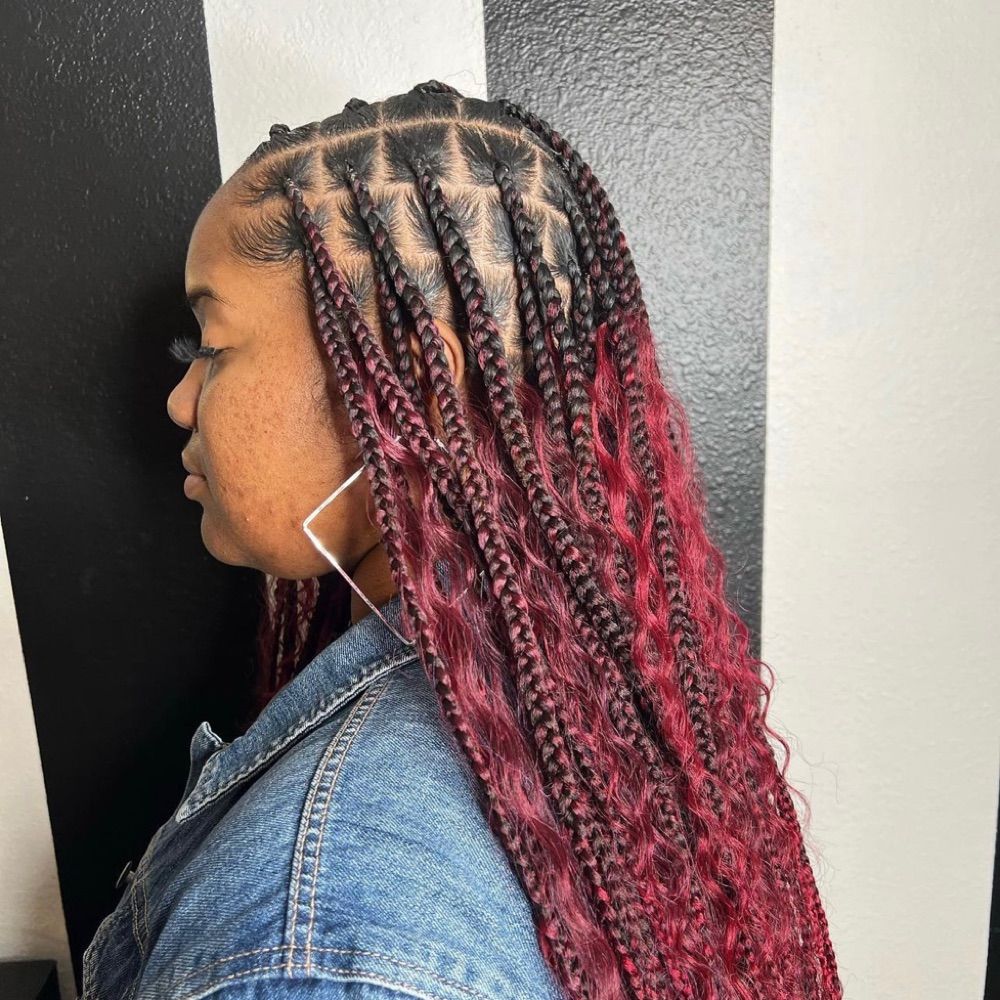Hair work by Braids By Us
