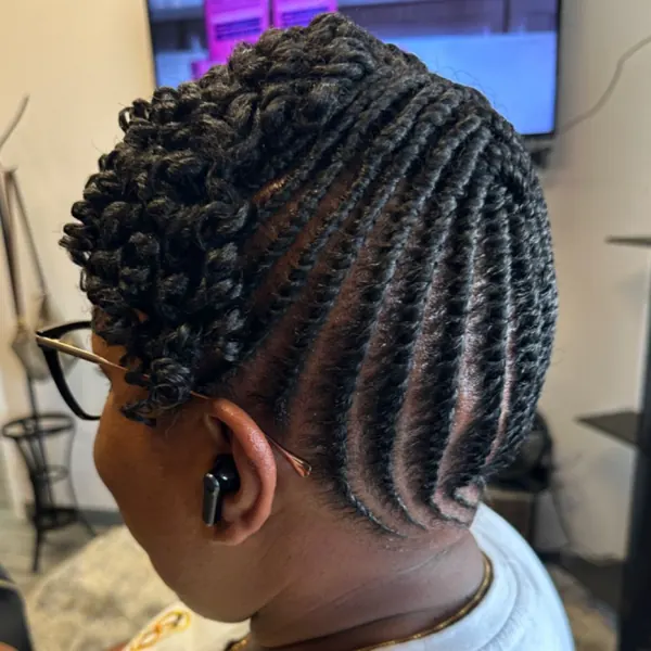 Hair work by Kinky Curly Beauty's Hair Studio