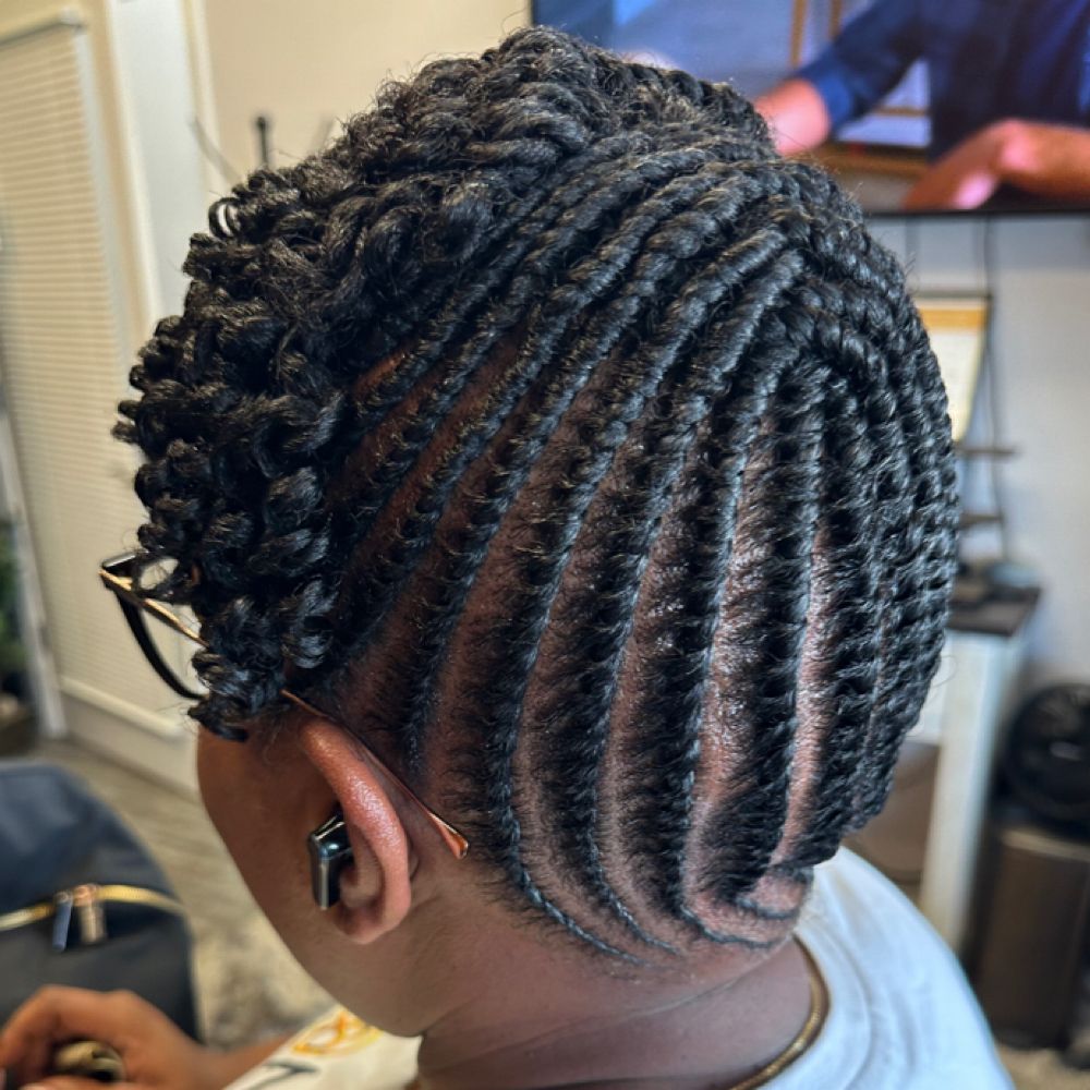 Hair work by Kinky Curly Beauty's Hair Studio