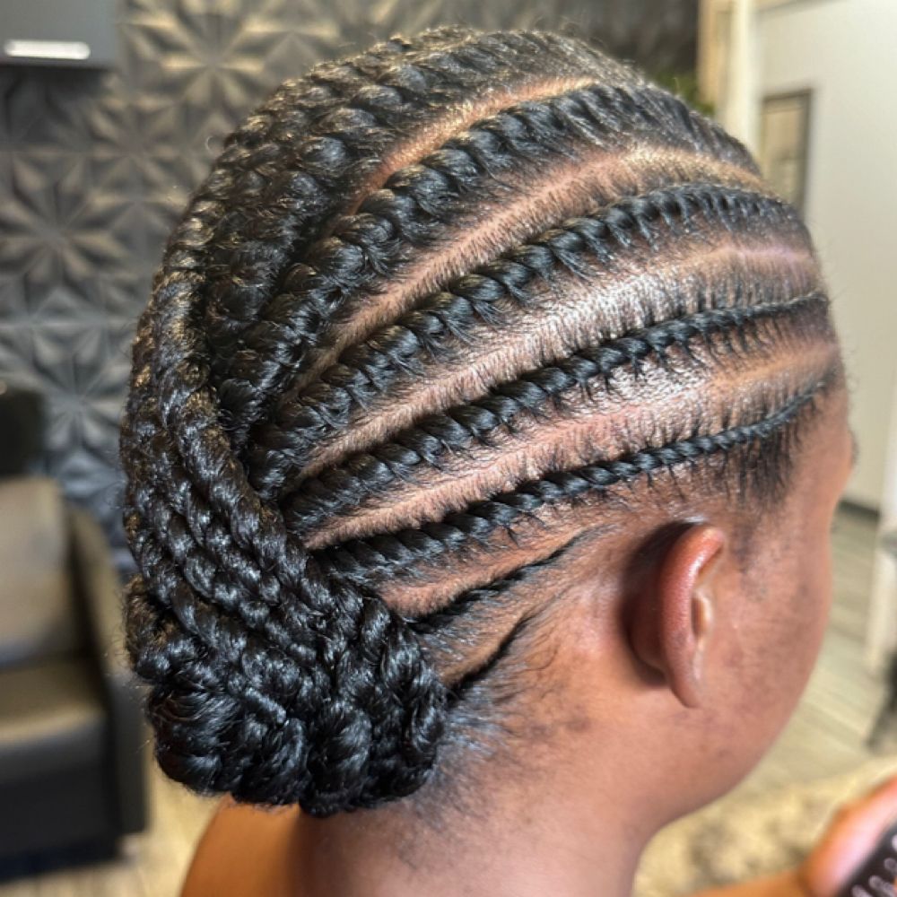 Hair work by Kinky Curly Beauty's Hair Studio