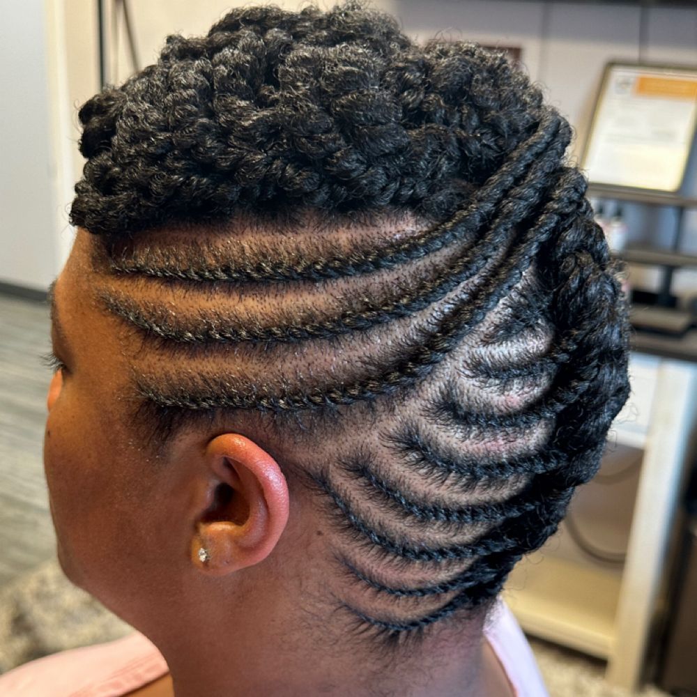 Hair work by Kinky Curly Beauty's Hair Studio