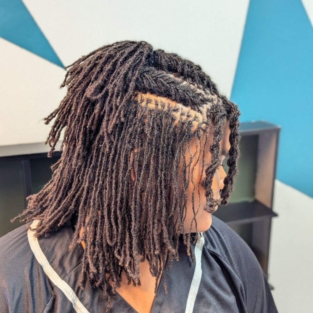 Hair work by Lofty Locs & Tresses