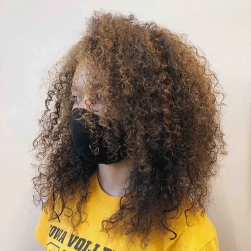 Hair work by The Curl Center