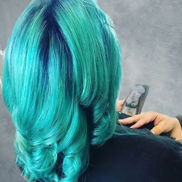 Hair work by The Looking-Glass Salon and Spa
