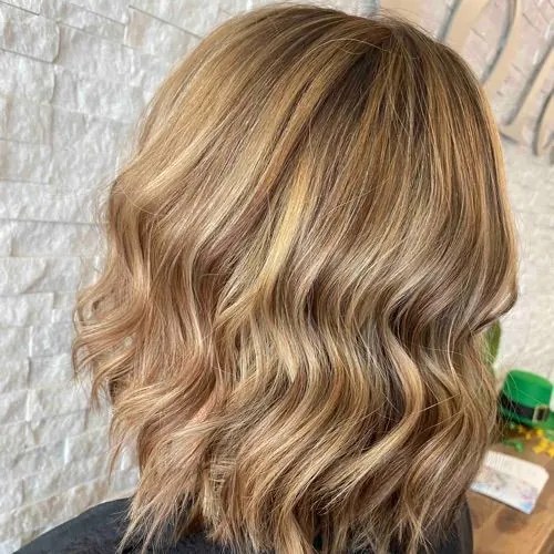 Hair work by The Looking-Glass Salon and Spa