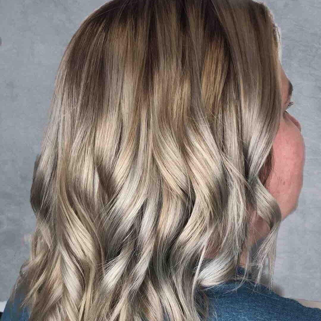 Hair work by The Looking-Glass Salon and Spa