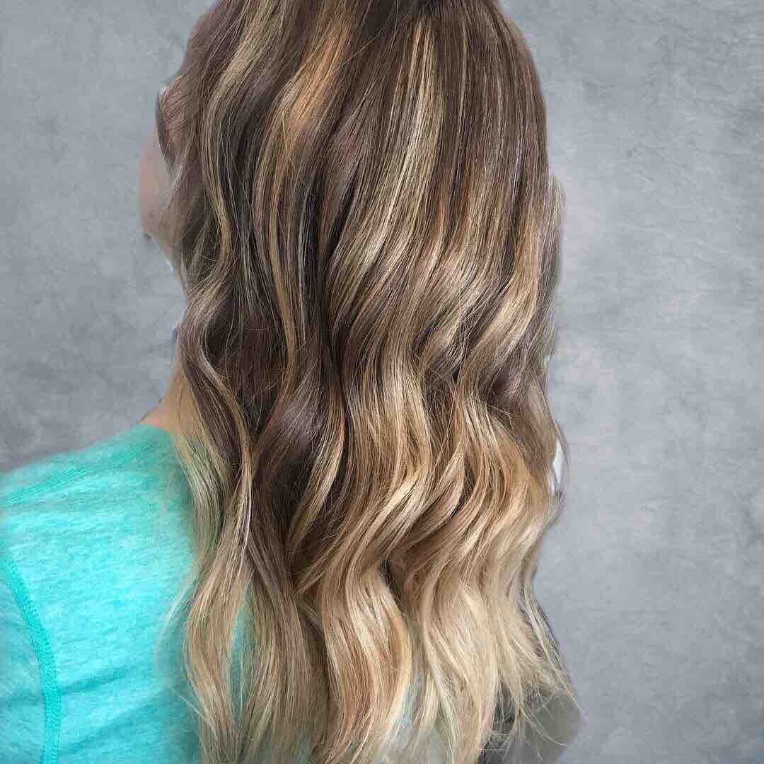 Hair work by The Looking-Glass Salon and Spa